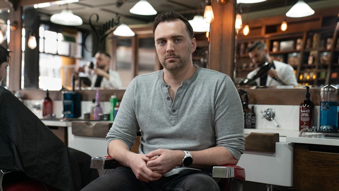 Mo bro, Conor, sat in a barber chair