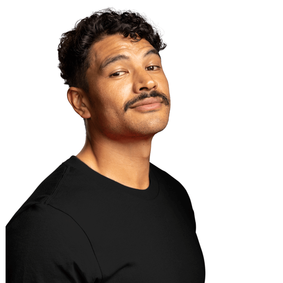 Photo of a man with an excellent moustache, looking to camera.